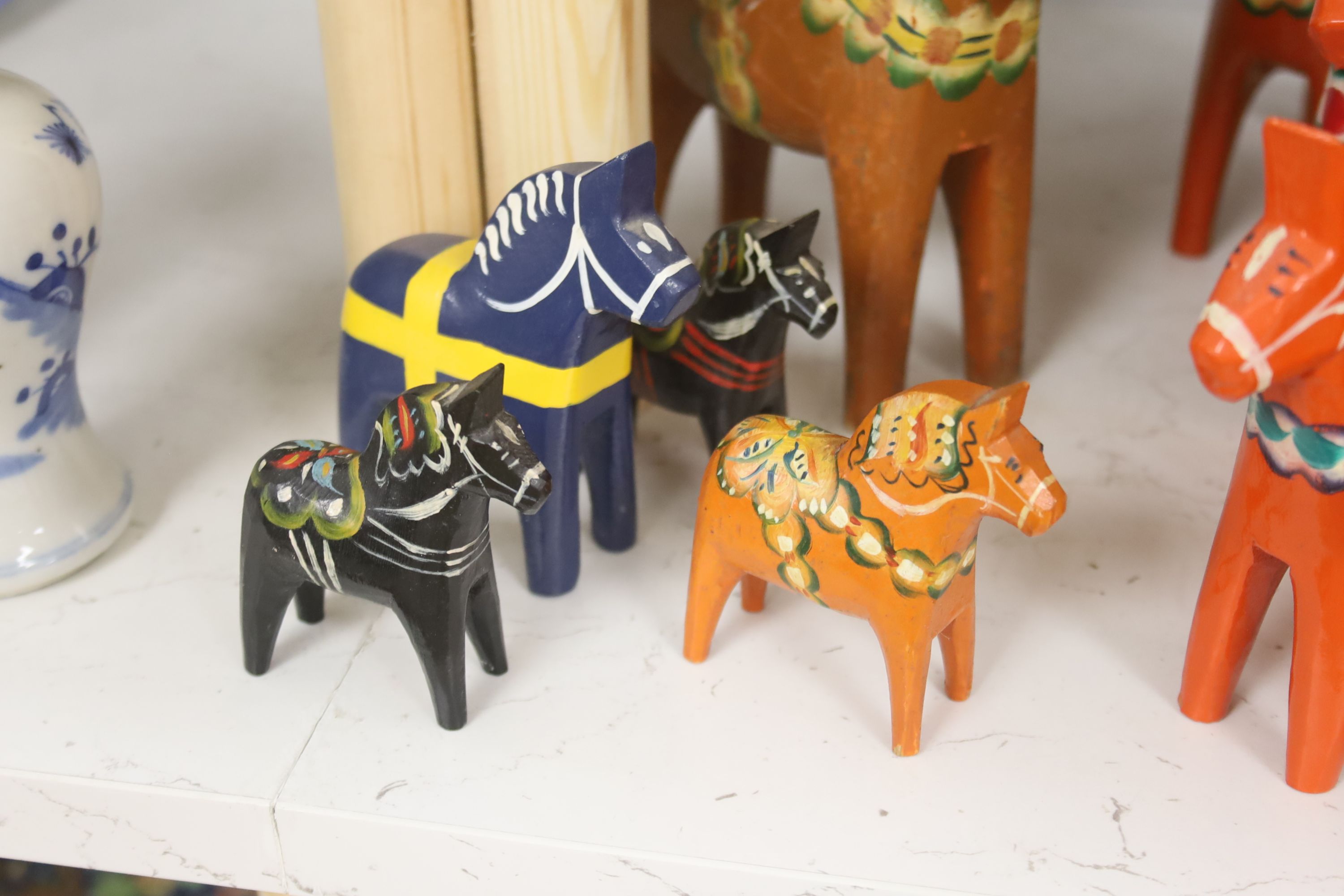 Ten Swedish painted wood Folk Art horses, some by Akta